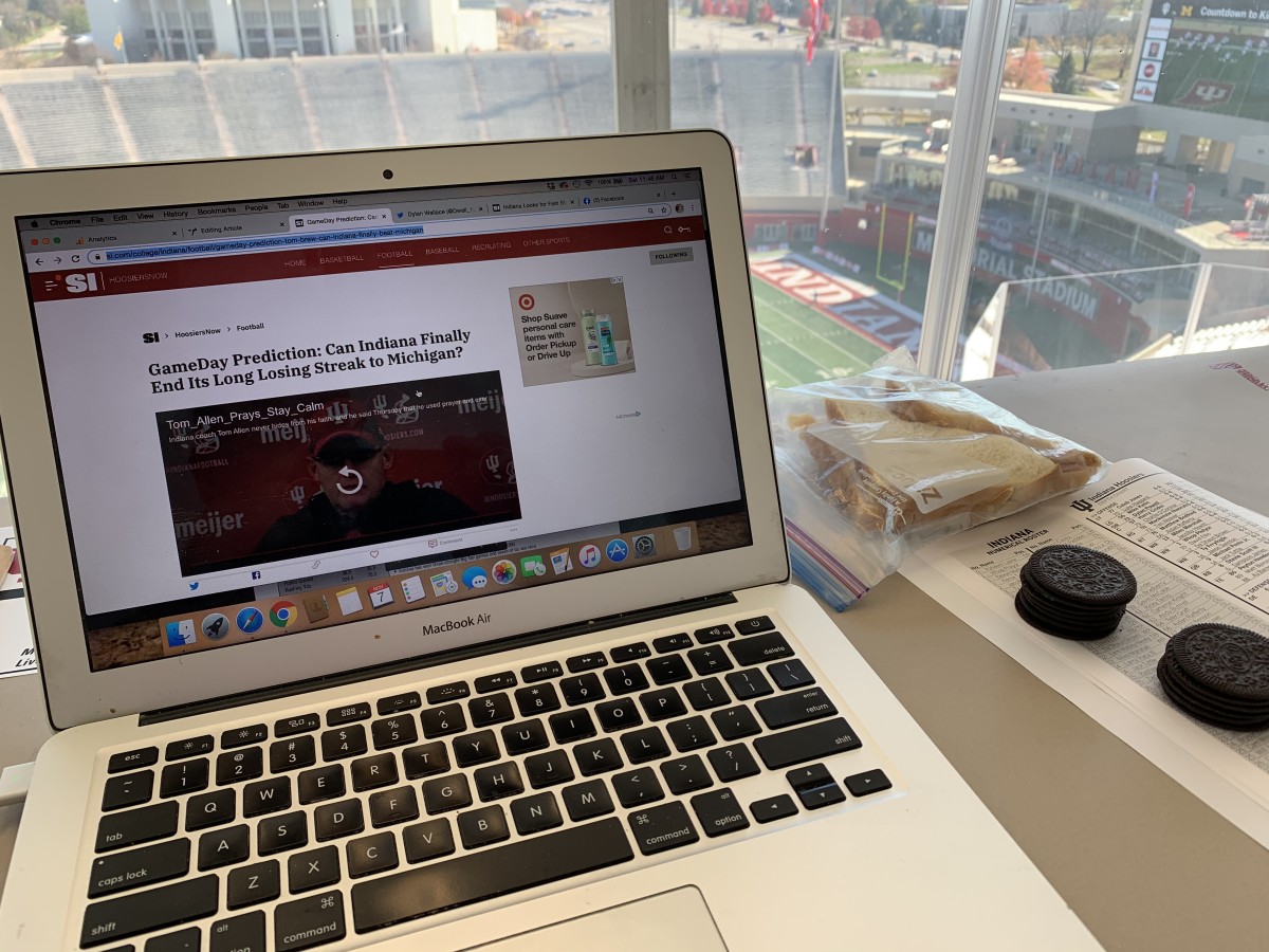 BYO lunch in the Memorial Stadium press box. Going all in "Rounders'' style on Oreo cookies.
